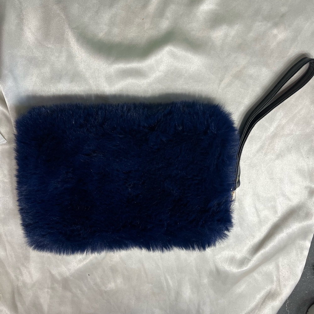 Fuzzy blue clutch bag